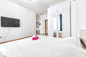 TV a/nebo společenská místnost v ubytování Expo residence