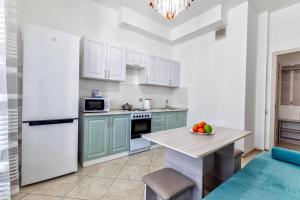 Kuchyň nebo kuchyňský kout v ubytování Expo residence