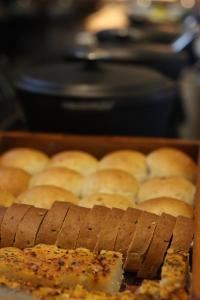 a tray of buns in a baking pan at Le Meridien Kochi in Cochin