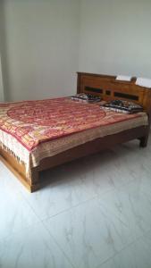 Letto o letti in una camera di Sandaru Hotel & Homestay