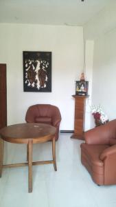 Zona de estar de Sandaru Hotel & Homestay