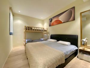 Ένα ή περισσότερα κρεβάτια σε δωμάτιο στο Armadale Residence-3R3B-GalaCity Airport-Free 2 Parking