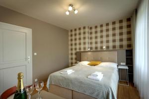 Krevet ili kreveti u jedinici u okviru objekta APARTMÁNY ADAM