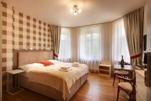 Krevet ili kreveti u jedinici u okviru objekta APARTMÁNY ADAM