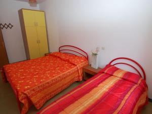 Cama o camas de una habitación en Fabulous Apartment in Rosolina Mare near Sea