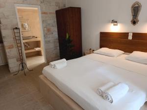 Posteľ alebo postele v izbe v ubytovaní Naxos Summerland resort