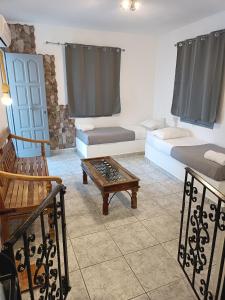Posteľ alebo postele v izbe v ubytovaní Naxos Summerland resort