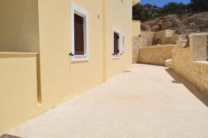 Fotografie z fotogalerie ubytování Zoe's House w/ Panoramic View 2BR AC 5min walk DT v destinaci Karpathos