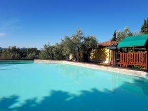 The swimming pool at or close to charming residence in the hills surrounding La Spezia