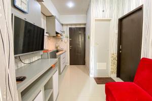 TV a/nebo společenská místnost v ubytování The Jarrdin Apartment by Tempat Singgah