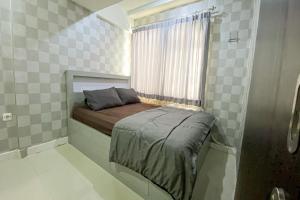 Postel nebo postele na pokoji v ubytování The Jarrdin Apartment by Tempat Singgah