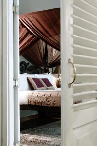 Letto o letti in una camera di Maniumpathy Hotel