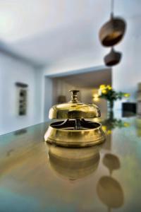 a telephone sitting on top of a table at Kalidon beach Hotel in Kokkari