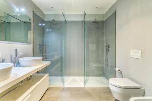 A bathroom at San Maurilio Apartment