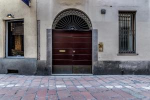 The facade or entrance of San Maurilio Apartment