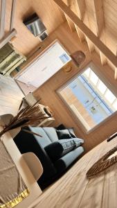 an overhead view of a living room in a tiny house at Nadmorska Magia in Bobolin