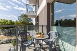 Balkón alebo terasa v ubytovaní Green Square Apartments Świnoujście by Noclegi Renters