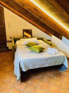 Letto o letti in una camera di Casa Mercurio