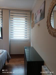 Łóżko lub łóżka w pokoju w obiekcie Apartamento Piscina 2G by Urraca Suites Viveiro