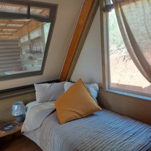 A bed or beds in a room at Il Castagno Toscana Glamping