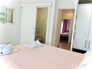 Postel nebo postele na pokoji v ubytování Villa Legacy 2