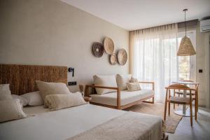 Postel nebo postele na pokoji v ubytování Apartamentos Top Secret Es Pujols - Formentera Vacaciones