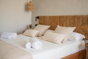Postel nebo postele na pokoji v ubytování Apartamentos Top Secret Es Pujols - Formentera Vacaciones
