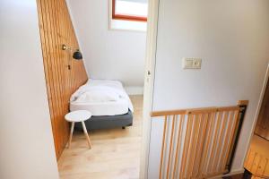 Postel nebo postele na pokoji v ubytování Schuurmanstraat 133