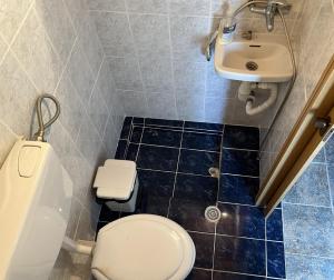 Ένα μπάνιο στο Urban House Koukouroumas