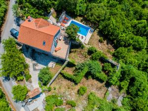 an overhead view of a house with a swimming pool at Villa Toscana with a pool in Tivat