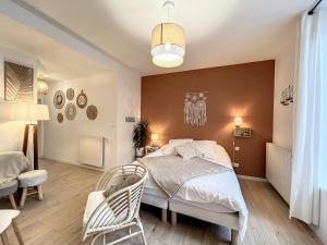Posteľ alebo postele v izbe v ubytovaní Appart LE SCANDINAVE - Maison 1911 - confort & prestige