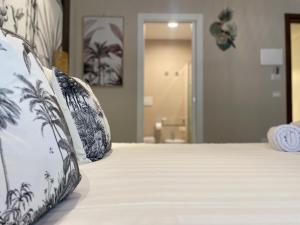 Postel nebo postele na pokoji v ubytování Hermitage Suites