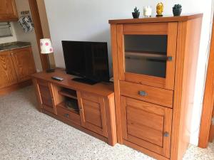 TV a/nebo společenská místnost v ubytování Apartment 3 minutes from Puerto Rico beach