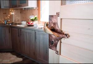 Kuhinja oz. manjša kuhinja v nastanitvi Koča Velika Planina - Chalet Kamrica