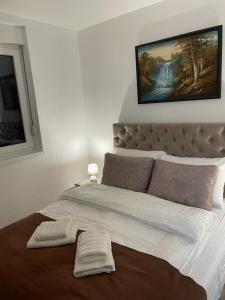 Postel nebo postele na pokoji v ubytování Apartman Splendid