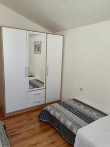 Posteľ alebo postele v izbe v ubytovaní Family apartments Grguric