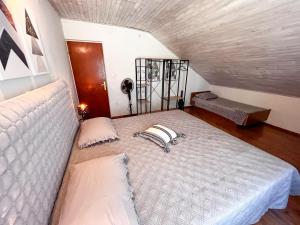 Posteľ alebo postele v izbe v ubytovaní Apartment Cesare 3