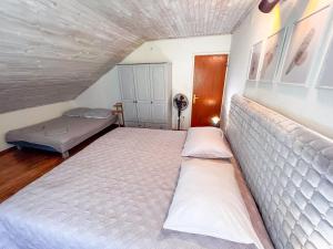 Posteľ alebo postele v izbe v ubytovaní Apartment Cesare 3