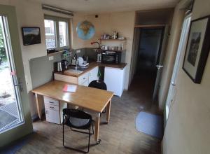 Kuchyň nebo kuchyňský kout v ubytování cosyTinyhouse Großburschla
