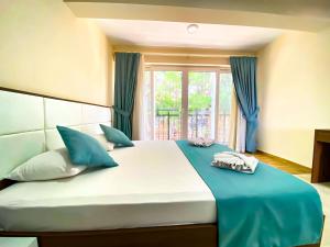 Postel nebo postele na pokoji v ubytování Nokta Belcekız Suit Apart, Fethiye, Ölüdeniz + 3 fotografie