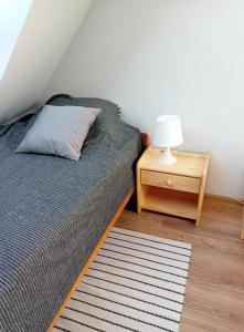 Postel nebo postele na pokoji v ubytování Domki Grażyna