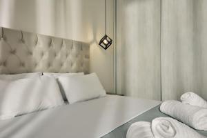 Cama ou camas em um quarto em Mouzaki's Stone Villas