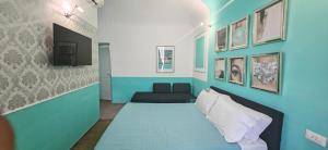 ローマにあるThe B Place Colaの青い部屋(ベッド1台、ソファ付)
