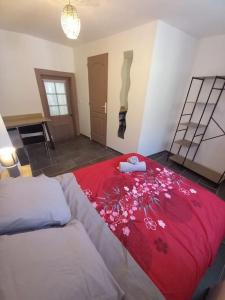 Katil atau katil-katil dalam bilik di le cottage Arédien 1