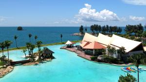 an aerial view of the pool at a resort at The Empire Brunei in Bandar Seri Begawan