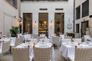 Restoran või mõni muu söögikoht majutusasutuses Nolinski Venezia - Evok Collection