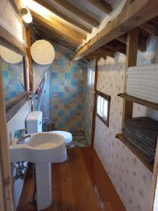 a bathroom with a sink and a toilet at Yasun Gallery in Gyeongju