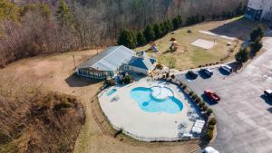 an overhead view of a large swimming pool with a building at MVC - Unit 3606 in Pigeon Forge