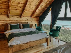 Postel nebo postele na pokoji v ubytování Mavera Suit Bungalow