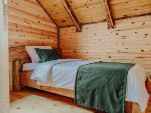 Postel nebo postele na pokoji v ubytování Mavera Suit Bungalow